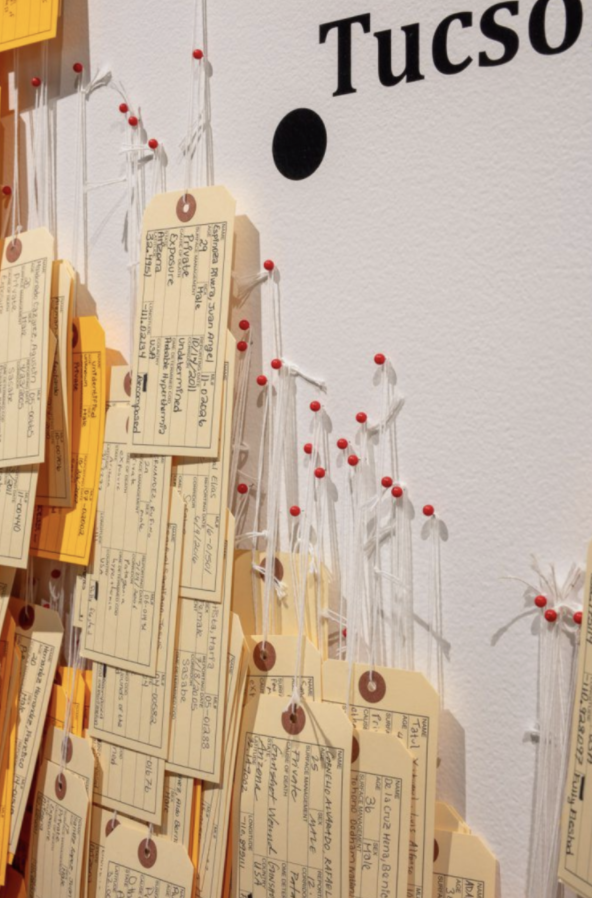 Detail, close up image of toe tag wall
